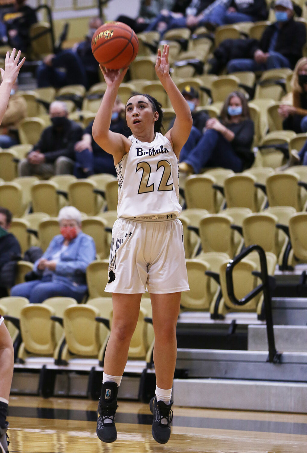 Cantrell Rosalez takes a shot from outside the key